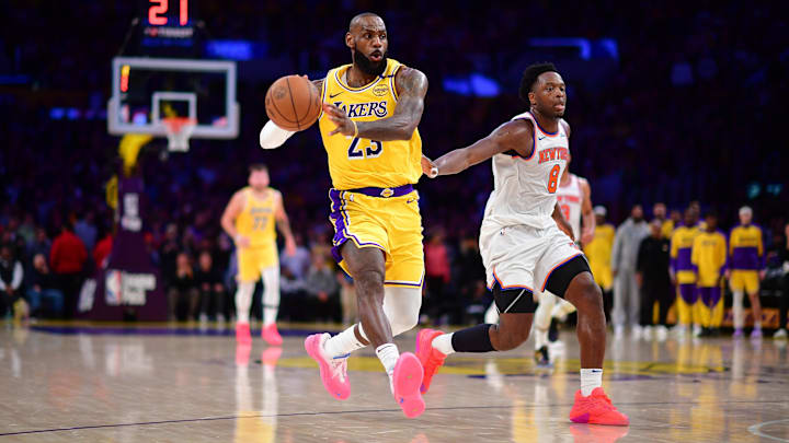 Mar 6, 2025; Los Angeles, California, USA; Los Angeles Lakers forward LeBron James (23) passes the ball ahead of New York Knicks forward OG Anunoby (8) during the second half at Crypto.com Arena. Mandatory Credit: Gary A. Vasquez-Imagn Images Mar 6, 2025; Los Angeles, California, USA; Los Angeles Lakers forward LeBron James (23) passes the ball ahead of New York Knicks forward OG Anunoby (8) during the second half at Crypto.com Arena. Mandatory Credit: Gary A. Vasquez-Imagn Images