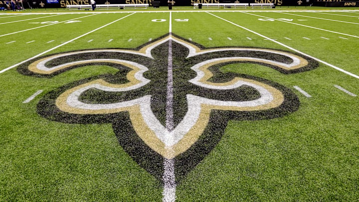 Oct 30, 2022; New Orleans, Louisiana, USA;  General view of the New Orleans Saints logo as the midfield logo fleur-de-lis after the game between the New Orleans Saints and the Las Vegas Raiders at Caesars Superdome. Mandatory Credit: Stephen Lew-Imagn Images