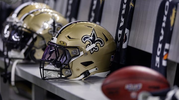 Nov 5, 2023; New Orleans, Louisiana, USA;  Detailed view of the New Orleans Saints helmets on the team bench against the Chicago Bears during the first half at the Caesars Superdome. Mandatory Credit: Stephen Lew-Imagn Images