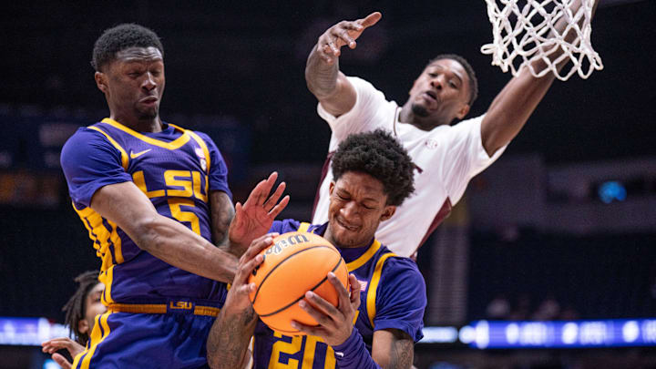 LSU Tigers forward Derek Fountain (20) grabs a rebound against the Mississippi State Bulldogs during their first round game of the SEC Men's Basketball Tournament at Bridgestone Arena in Nashville, Tenn., Wednesday, March 12, 2025.