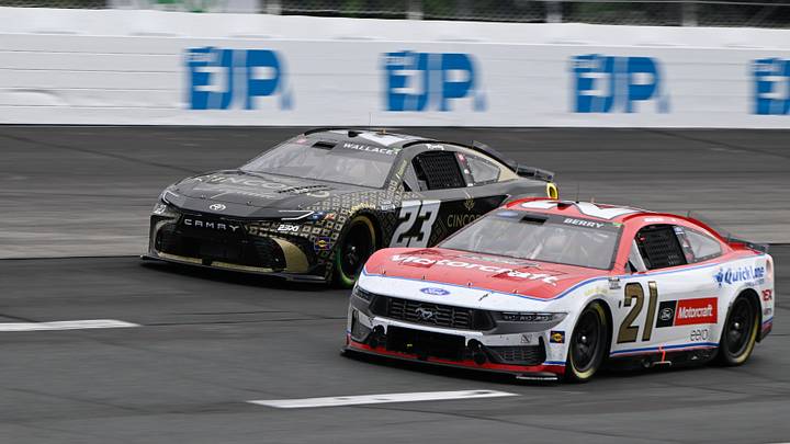 Aug 23, 2026; Loudon, New Hampshire, USA; Wood Brothers Racing driver Josh Berry (21) and 23XI Racing driver Bubba Wallace (23) race in the Dollar Tree 301 at New Hampshire Motor Speedway.