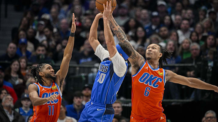 Dec 2, 2023; Dallas, Texas, USA; Dallas Mavericks guard Seth Curry (30) attempts to shoot over Oklahoma City Thunder guard Isaiah Joe (11) and forward Jaylin Williams (6) during the second quarter at the American Airlines Center. Mandatory Credit: Jerome Miron-Imagn Images Dec 2, 2023; Dallas, Texas, USA; Dallas Mavericks guard Seth Curry (30) attempts to shoot over Oklahoma City Thunder guard Isaiah Joe (11) and forward Jaylin Williams (6) during the second quarter at the American Airlines Center. Mandatory Credit: Jerome Miron-Imagn Images