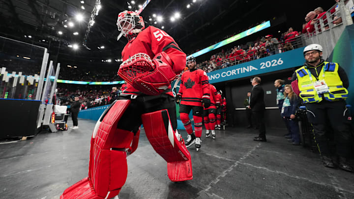 Feb 20, 2026; Milan, Italy; Jordan Binnington (50) of Canada takes the ice for the second period against Finland in a men's ice hockey semifinal during the Milano Cortina 2026 Olympic Winter Games at Milano Santagiulia Ice Hockey Arena. Mandatory Credit: James Lang-Imagn Images