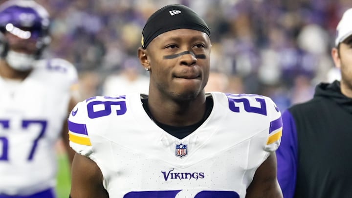Jan 13, 2025; Glendale, AZ, USA; Minnesota Vikings safety Theo Jackson (26) against the Los Angeles Rams during an NFC wild card game at State Farm Stadium. Mandatory Credit: Mark J. Rebilas-Imagn Images