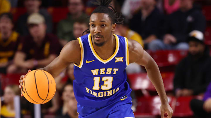 Jan 21, 2026; Tempe, Arizona, USA; West Virginia Mountaineers guard Chance Moore (13) against the Arizona State Sun Devils at Desert Financial Arena. Mandatory Credit: Mark J. Rebilas-Imagn Images Jan 21, 2026; Tempe, Arizona, USA; West Virginia Mountaineers guard Chance Moore (13) against the Arizona State Sun Devils at Desert Financial Arena. Mandatory Credit: Mark J. Rebilas-Imagn Images