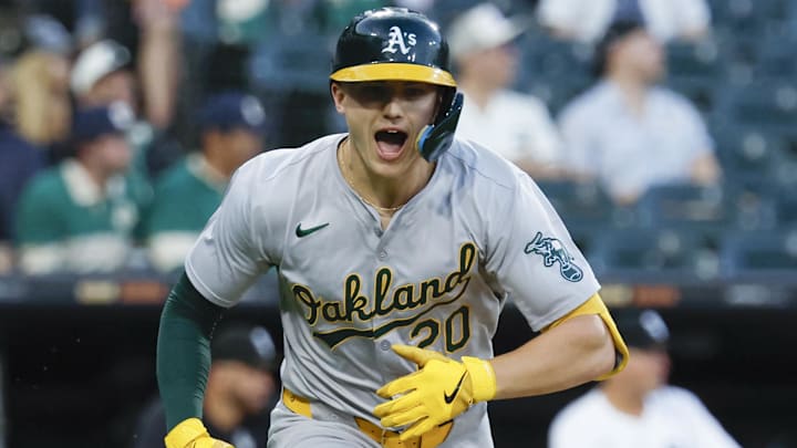 Sep 14, 2024; Chicago, Illinois, USA; Oakland Athletics second baseman Zack Gelof (20) reacts after hitting a single against the Chicago White Sox during the second inning at Guaranteed Rate Field. Mandatory Credit: Kamil Krzaczynski-Imagn Images
