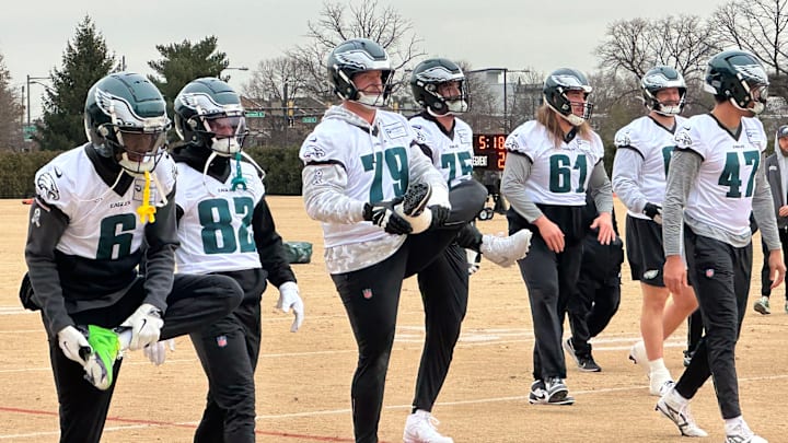 Philadelphia Eagles, including DeVonta Smith (left), get loose during Week 16 practice. Philadelphia Eagles, including DeVonta Smith (left), get loose during Week 16 practice.