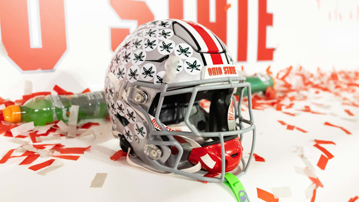 Jan 20, 2025; Atlanta, GA, USA; Detailed view of confetti with an Ohio State Buckeyes helmet after winning the CFP National Championship college football game at Mercedes-Benz Stadium. Mandatory Credit: Mark J. Rebilas-Imagn Images
