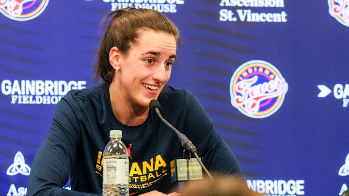 IndyStar sports reporter Chloe Peterson listens to Indiana Fever guard Caitlin Clark (22) answer a question on Friday, Sept. 13, 2024, during a game between the Indiana Fever and the Las Vegas Aces in Indianapolis. The Aces defeated the Fever, 78-74. IndyStar sports reporter Chloe Peterson listens to Indiana Fever guard Caitlin Clark (22) answer a question on Friday, Sept. 13, 2024, during a game between the Indiana Fever and the Las Vegas Aces in Indianapolis. The Aces defeated the Fever, 78-74.