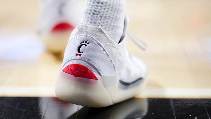Jan 11, 2025; Cincinnati, Ohio, USA; The Cincinnati logo is seen on a pair of Air Jordan shoes worn by a member of the Cincinnati Bearcats before the game against the Kansas Jayhawks at Fifth Third Arena. Mandatory Credit: Aaron Doster-Imagn Images Jan 11, 2025; Cincinnati, Ohio, USA; The Cincinnati logo is seen on a pair of Air Jordan shoes worn by a member of the Cincinnati Bearcats before the game against the Kansas Jayhawks at Fifth Third Arena. Mandatory Credit: Aaron Doster-Imagn Images