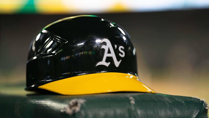 Jul 23, 2024; Oakland, California, USA;  General view of an Oakland Athletics helmet after defeating the Houston Astros at Oakland-Alameda County Coliseum. Mandatory Credit: Stan Szeto-Imagn Images