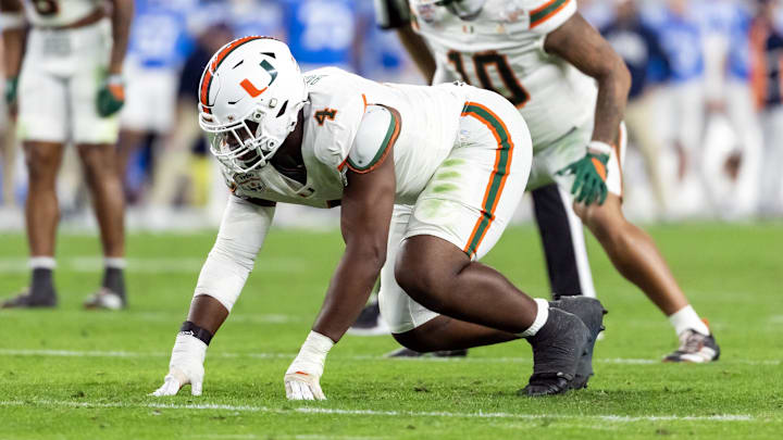 Jan 8, 2026; Glendale, AZ, USA; Miami Hurricanes defensive lineman Rueben Bain Jr. (4) against the Mississippi Rebels during the 2026 Fiesta Bowl and semifinal game of the College Football Playoff at State Farm Stadium. Mandatory Credit: Mark J. Rebilas-Imagn Images Jan 8, 2026; Glendale, AZ, USA; Miami Hurricanes defensive lineman Rueben Bain Jr. (4) against the Mississippi Rebels during the 2026 Fiesta Bowl and semifinal game of the College Football Playoff at State Farm Stadium. Mandatory Credit: Mark J. Rebilas-Imagn Images