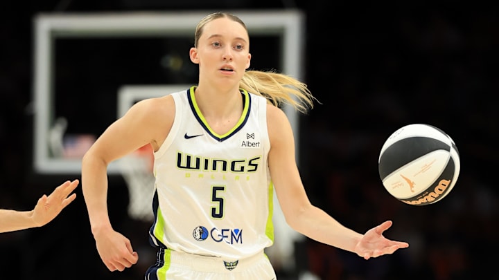 Jun 11, 2025; Phoenix, Arizona, USA; Dallas Wings guard Paige Bueckers (5) against the Phoenix Mercury at PHX Arena. Mandatory Credit: Mark J. Rebilas-Imagn Images