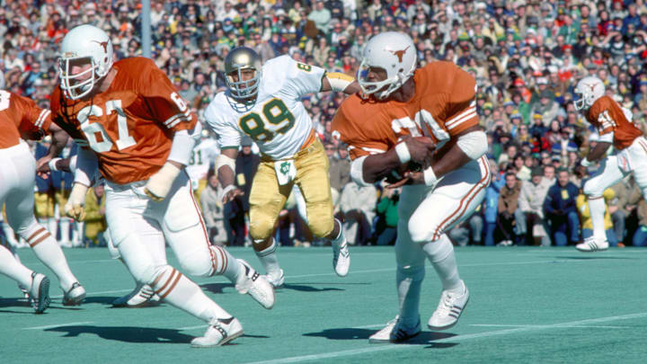 Jan 1, 1978; Dallas, TX, USA; FILE PHOTO; Texas Longhorns running back (20) Earl Campbell in action against the Notre Dame Irish in the 1978 Cotton Bowl. Mandatory Credit: Photo By Malcolm Emmons- Imagn Images
