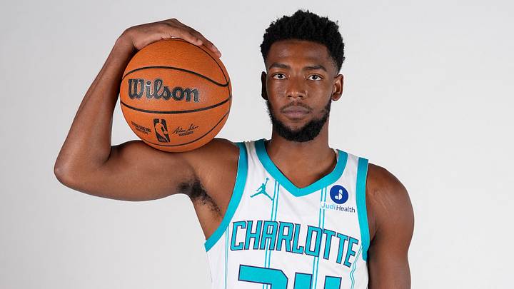 Charlotte Hornets player Brandon Miller (24) poses for photos during media day Charlotte Hornets player Brandon Miller (24) poses for photos during media day