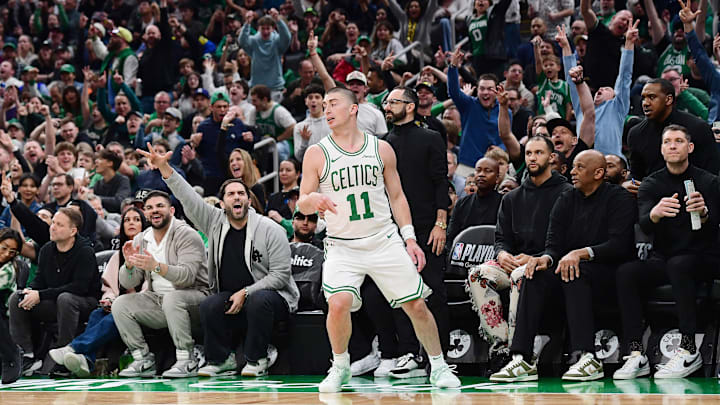 Apr 20, 2025; Boston, Massachusetts, USA; Fans cheer after a three point basket by Boston Celtics guard Payton Pritchard (11) during the second half against the Orlando Magic at TD Garden. Mandatory Credit: Bob DeChiara-Imagn Images