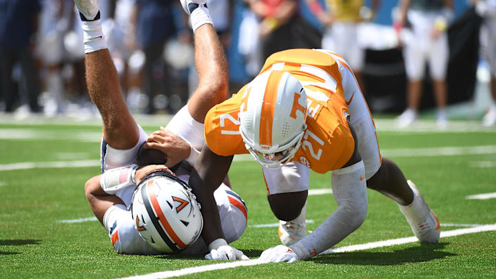 Sep 2, 2023; Nashville, Tennessee, USA; Virginia Cavaliers quarterback Tony Muskett (11) is sacked