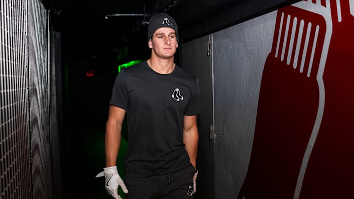 Top Red Sox prospect Roman Anthony walks toward the batting cage Tuesday at Fenway Park.