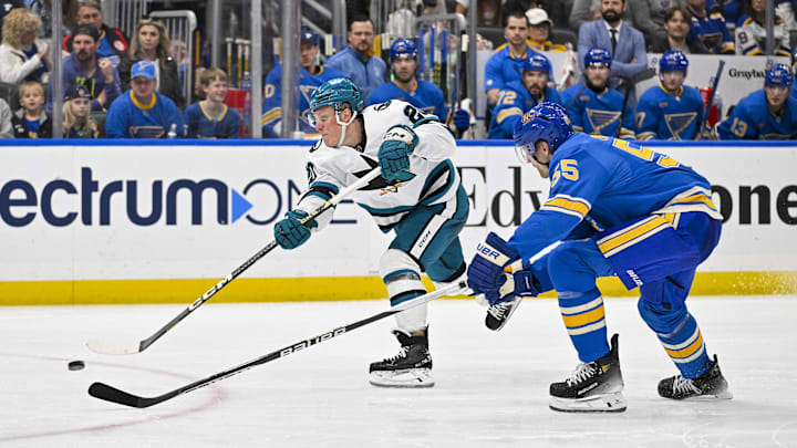 Mar 30, 2024; St. Louis, Missouri, USA;  San Jose Sharks left wing Fabian Zetterlund (20) shoots as