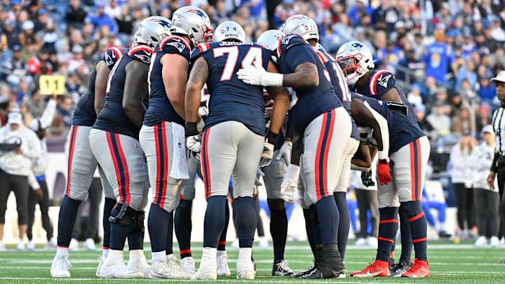 Nov 17, 2024; Foxborough, Massachusetts, USA; The New England Patriots huddle during the second half against the Los Angeles Rams at Gillette Stadium. Mandatory Credit: Eric Canha-Imagn Images