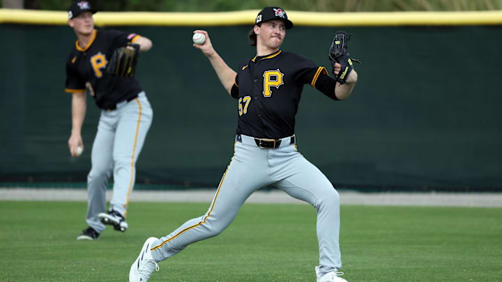 Feb 12, 2025; Bradenton, FL, USA;  Pittsburgh Pirates pitcher Bubba Chandler and pitcher Mitch Keller (23) during spring training works out at Pirate City. Mandatory Credit: Kim Klement Neitzel-Imagn Images