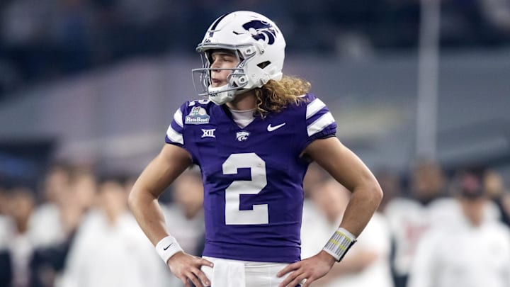 Dec 26, 2024; Phoenix, AZ, USA; Kansas State Wildcats quarterback Avery Johnson (2) against the Rutgers Scarlet Knights during the Rate Bowl at Chase Field. Mandatory Credit: Mark J. Rebilas-Imagn Images