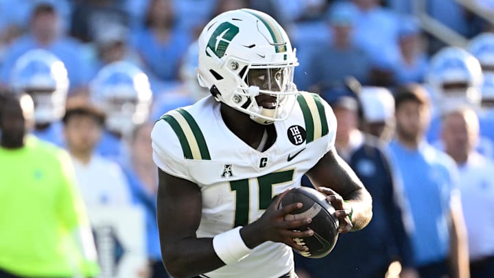 Sep 7, 2024; Chapel Hill, North Carolina, USA; Charlotte 49ers quarterback Deshawn Purdie (15) looks to pass in the third quarter at Kenan Memorial Stadium. Mandatory Credit: Bob Donnan-Imagn Images