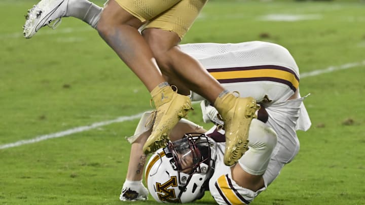 Minnesota defensive back Koi Perich takes a tumble after intercepting a pass by UCLA quarterback Ethan Garbers (not pictured) on the final play of the game at Rose Bowl in Pasadena, Calif., on Oct. 12, 2024. Minnesota defensive back Koi Perich takes a tumble after intercepting a pass by UCLA quarterback Ethan Garbers (not pictured) on the final play of the game at Rose Bowl in Pasadena, Calif., on Oct. 12, 2024.