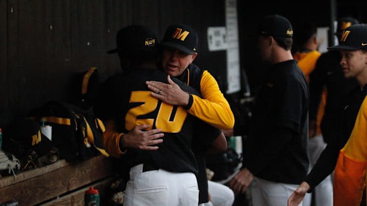 March 24, 2026; O’Fallon, Missouri; Missouri baseball pitcher PJ Green (20) hugs pitching coach during a game against Illinois at CarShield Field.