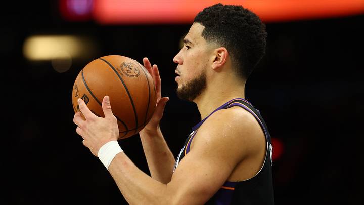 Apr 27, 2026; Phoenix, Arizona, USA; Phoenix Suns guard Devin Booker (1) against the Oklahoma City Thunder in the second half during game four of the first round of the 2026 NBA Playoffs at Mortgage Matchup Center. Mandatory Credit: Mark J. Rebilas-Imagn Images Apr 27, 2026; Phoenix, Arizona, USA; Phoenix Suns guard Devin Booker (1) against the Oklahoma City Thunder in the second half during game four of the first round of the 2026 NBA Playoffs at Mortgage Matchup Center. Mandatory Credit: Mark J. Rebilas-Imagn Images