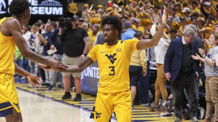 Jan 10, 2026; Morgantown, West Virginia, USA; West Virginia Mountaineers guard Honor Huff (3) celebrates after defeating the Kansas Jayhawks at Hope Coliseum. Mandatory Credit: Ben Queen-Imagn Images