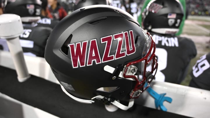 Nov 17, 2023; Pullman, Washington, USA; Washington State Cougars helmet sits during a game against the Colorado Buffaloes in the second half at Gesa Field at Martin Stadium. Mandatory Credit: James Snook-USA TODAY Sports