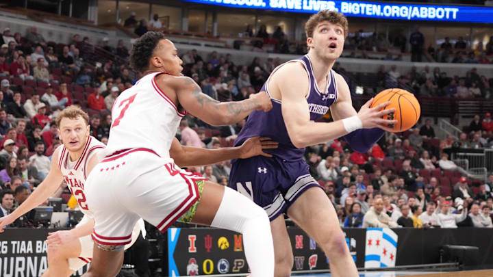 Mar 11, 2026; Chicago, IL, USA: Indiana Hoosiers forward Nick Dorn (7) defends Northwestern Wildcats forward Nick Martinelli (2) during the second half at United Center. Mandatory Credit: David Banks-Imagn Images