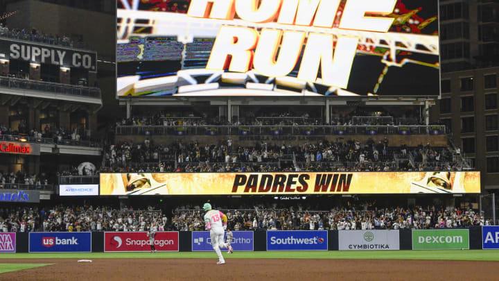 July 5, 2024; San Diego, California, USA; San Diego Padres third baseman Manny Machado (13) rounds the bases after hititng a walk-off home run during the ninth inning against the Arizona Diamondbacks at Petco Park. Mandatory Credit: Denis Poroy-USA TODAY Sports