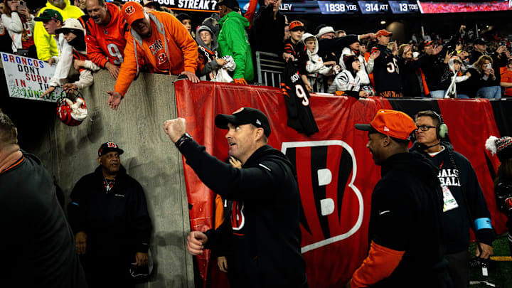 Cincinnati Bengals head coach Zac Taylor raises his fist while leaving the field after the NFL game at Paycor Stadium in Cincinnati on Saturday, Dec. 28, 2024. Cincinnati Bengals defeated Denver Broncos 30-24 in overtime.