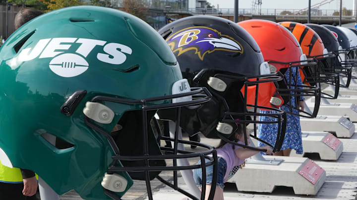 Oct 7, 2023; London, United Kingdom; Large oversized helmets of the New York Jets Baltimore Ravens, Cleveland Browns and Cincinnati Bengals at the NFL Experience London at the Battersea Power Station. Mandatory Credit: Kirby Lee-Imagn Images Oct 7, 2023; London, United Kingdom; Large oversized helmets of the New York Jets Baltimore Ravens, Cleveland Browns and Cincinnati Bengals at the NFL Experience London at the Battersea Power Station. Mandatory Credit: Kirby Lee-Imagn Images