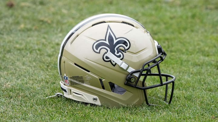 Aug 14, 2025; Carson, CA, USA; A New Orleans Saints helmet on the field during a joint practice against the Los Angeles Rams at the Dignity Health Sports Park. Mandatory Credit: Kirby Lee-Imagn Images