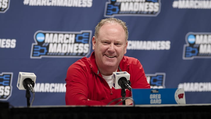 Mar 18, 2026; Portland, OR, USA; Wisconsin Badgers head coach Greg Gard answers questions from the media before a practice session ahead of the first round of the men's 2026 NCAA Tournament at Moda Center. Mandatory Credit: Troy Wayrynen-Imagn Images