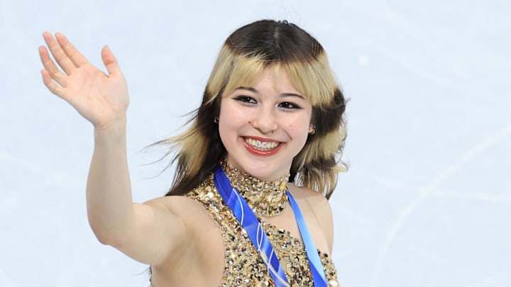 Feb 19, 2026; Milan, Italy; Alysa Liu of the United States celebrates with the gold medal in the women's free skate during the Milano Cortina 2026 Olympic Winter Games at Milano Ice Skating Arena.