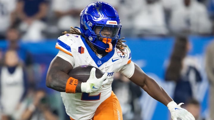 Dec 31, 2024; Glendale, AZ, USA; Boise State Broncos running back Ashton Jeanty (2) against the Penn State Nittany Lions during the Fiesta Bowl at State Farm Stadium. Mandatory Credit: Mark J. Rebilas-Imagn Images