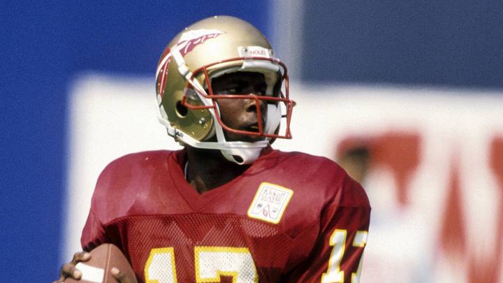 Aug 28, 1993; E.Rutherford, NJ, USA: FILE PHOTO; Florida State Seminoles quarterback Charlie Ward (17) during the game against Kansas at Giants Stadium. FSU defeated Kansas 42-0 Mandatory Credit: USA TODAY Sports Aug 28, 1993; E.Rutherford, NJ, USA: FILE PHOTO; Florida State Seminoles quarterback Charlie Ward (17) during the game against Kansas at Giants Stadium. FSU defeated Kansas 42-0 Mandatory Credit: USA TODAY Sports