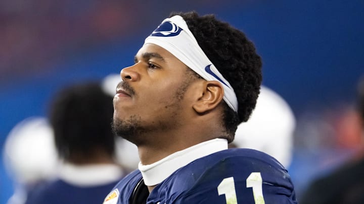 Dec 31, 2024; Glendale, AZ, USA; Penn State Nittany Lions defensive end Abdul Carter (11) reacts after suffering an injury against the Boise State Broncos in the Fiesta Bowl at State Farm Stadium. Mandatory Credit: Mark J. Rebilas-Imagn Images