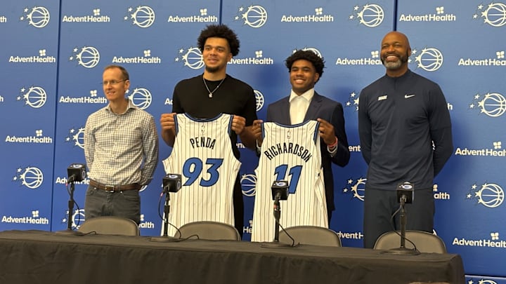 June 27, 2025: Jase Richardson and Noah Penda pose with Orlando Magic president of basketball operations Jeff Weltman and head coach Jamahl Mosley at an introductory Press Conference. 