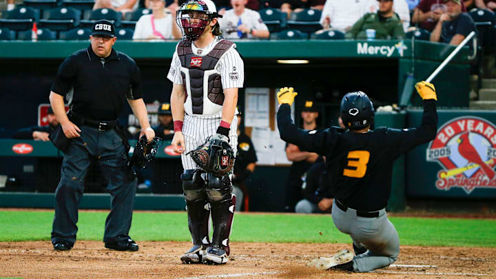 Mizzou's Danny Corona slides safely into home as the Tigers took on the Missouri State Beats at Hammons Field on Tuesday, April 16, 2024