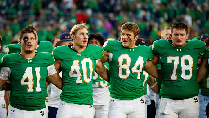Notre Dame celebrates winning a NCAA college football game 31-24 against Louisville at Notre Dame Stadium on Saturday, Sept. 28, 2024, in South Bend.