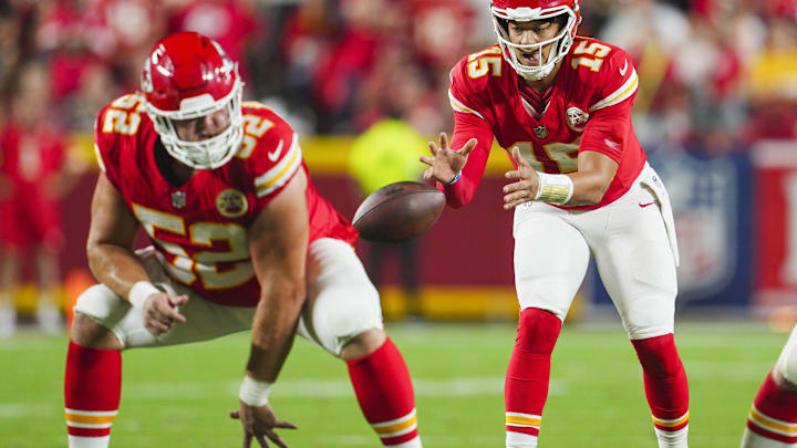 Sep 5, 2024; Kansas City, Missouri, USA; Kansas City Chiefs starting quarterback Patrick Mahomes (15) takes the snap from center Creed Humphrey (52) during the second half against the Baltimore Ravens at GEHA Field at Arrowhead Stadium. Mandatory Credit: Jay Biggerstaff-Imagn Images Sep 5, 2024; Kansas City, Missouri, USA; Kansas City Chiefs starting quarterback Patrick Mahomes (15) takes the snap from center Creed Humphrey (52) during the second half against the Baltimore Ravens at GEHA Field at Arrowhead Stadium. Mandatory Credit: Jay Biggerstaff-Imagn Images