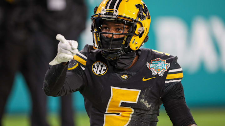 Dec 23, 2022; Tampa, Florida, USA; Missouri Tigers wide receiver Mookie Cooper (5) reacts after a play against the Missouri Tigers in the third quarter in the 2022 Gasparilla Bowl at Raymond James Stadium. Mandatory Credit: Nathan Ray Seebeck-Imagn Images Dec 23, 2022; Tampa, Florida, USA; Missouri Tigers wide receiver Mookie Cooper (5) reacts after a play against the Missouri Tigers in the third quarter in the 2022 Gasparilla Bowl at Raymond James Stadium. Mandatory Credit: Nathan Ray Seebeck-Imagn Images
