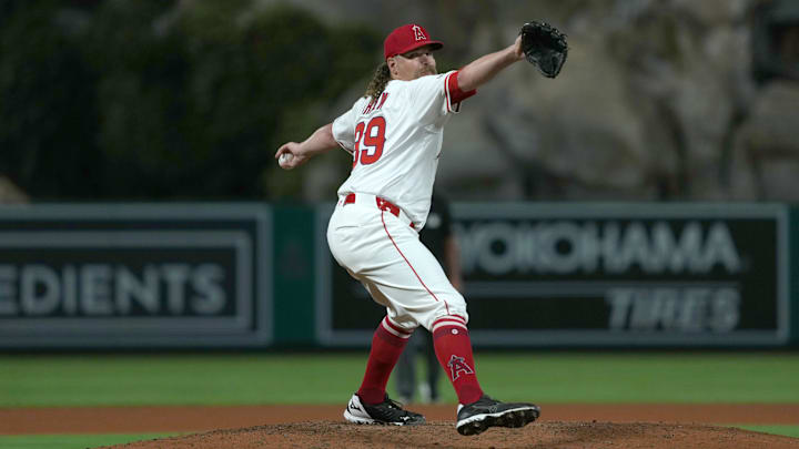 Aug 19, 2025; Anaheim, California, USA; Los Angeles Angels relief pitcher Andrew Chafin (39) throws in the seventh inning against the Cincinnati Reds at Angel Stadium. Mandatory Credit: Kirby Lee-Imagn Images
