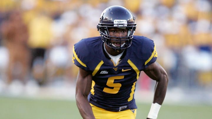 October 9, 2010; Morgantown,WV, USA; West Virginia Mountaineers receiver Ivan McCartney (5) breaks off the line of scrimmage in the 4th quarter against UNLV Runnin Rebels at Mountaineer Field at Milan Puskar Stadium. West Virginia Mountaineers defeated UNLV Runnin Rebels 49-10.Mandatory Credit: Charles LeClaire-USPRESSWIRE October 9, 2010; Morgantown,WV, USA; West Virginia Mountaineers receiver Ivan McCartney (5) breaks off the line of scrimmage in the 4th quarter against UNLV Runnin Rebels at Mountaineer Field at Milan Puskar Stadium. West Virginia Mountaineers defeated UNLV Runnin Rebels 49-10.Mandatory Credit: Charles LeClaire-USPRESSWIRE