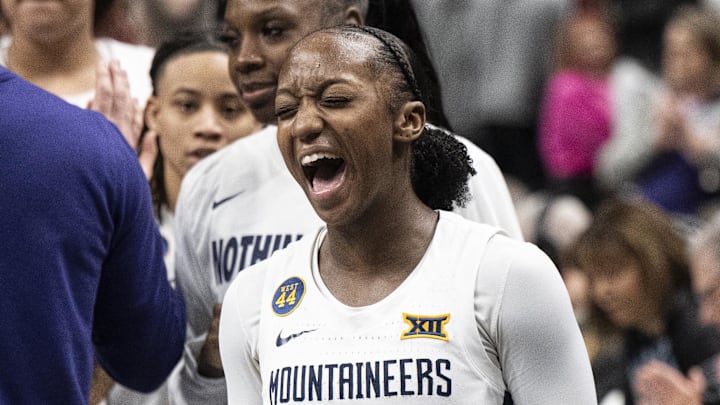 Mar 7, 2025; Kansas City, MO, USA; West Virginia Mountaineers guard Jordan Harrison (10) celebrates after defeating the Kansas State Wildcats at T-Mobile Center. Mandatory Credit: Amy Kontras-Imagn Images